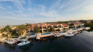 “build a house in Puerto Aventuras marina home construction”
