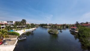 “build a house in Puerto Aventuras marina home construction”